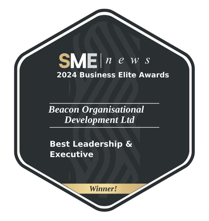 A hexagonal award plaque from SME News for the 2024 Business Elite Awards, given to Beacon Organisational Development Ltd for Best Leadership & Executive. The plaque includes a "Winner!" banner.