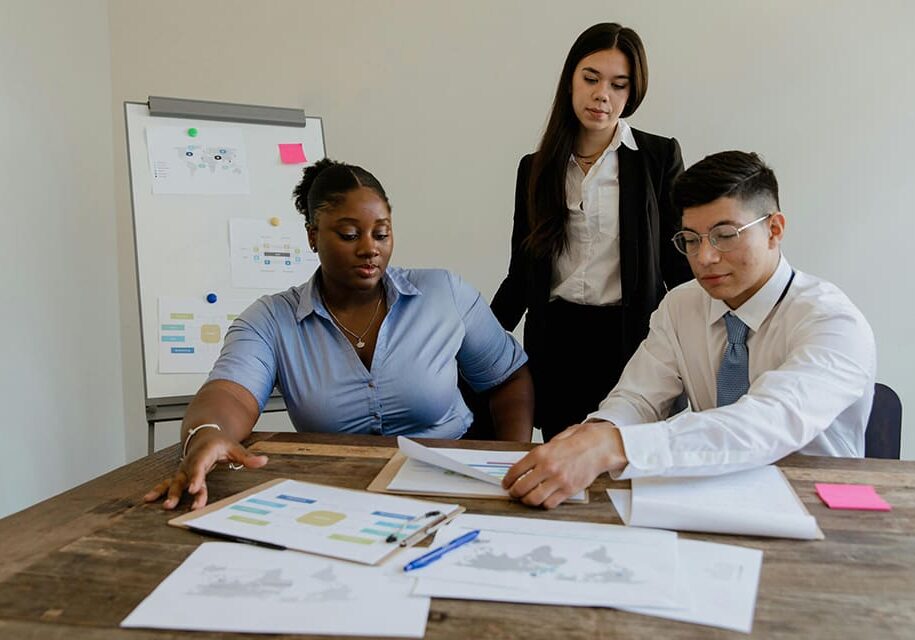 Businesspeople reviewing data at a meeting.